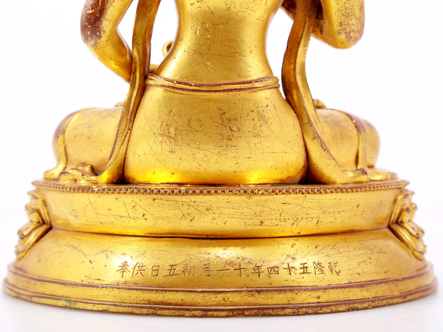 A solemn gilt bronze statue of Vajrasattva