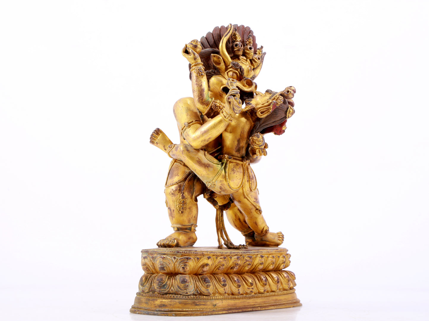 A solemn gilt bronze statue of Yamantaka Vajra