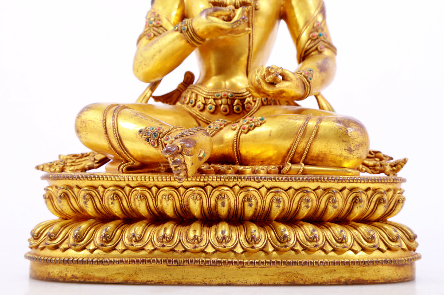 A solemn gilt bronze statue of Vajrasattva inlaid with hundreds of treasures