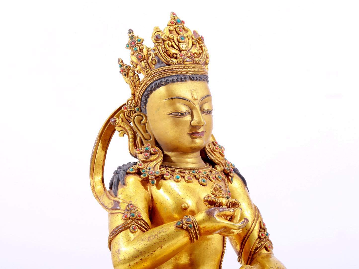 A solemn gilt bronze statue of Vajrasattva inlaid with hundreds of treasures