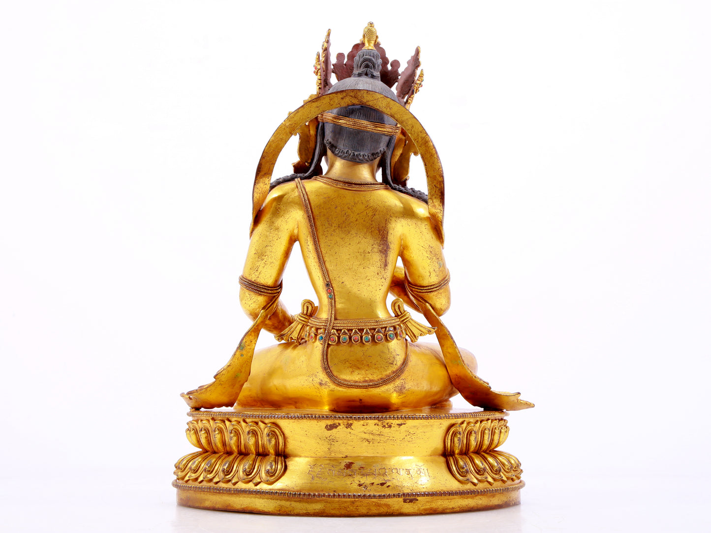 A solemn gilt bronze statue of Vajrasattva inlaid with hundreds of treasures