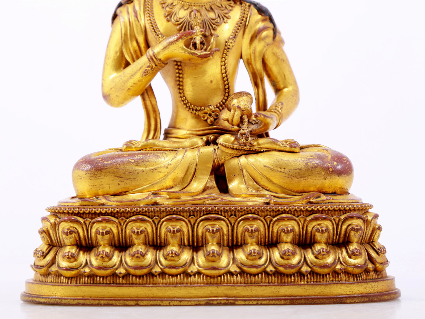 A solemn gilt bronze statue of Vajrasattva