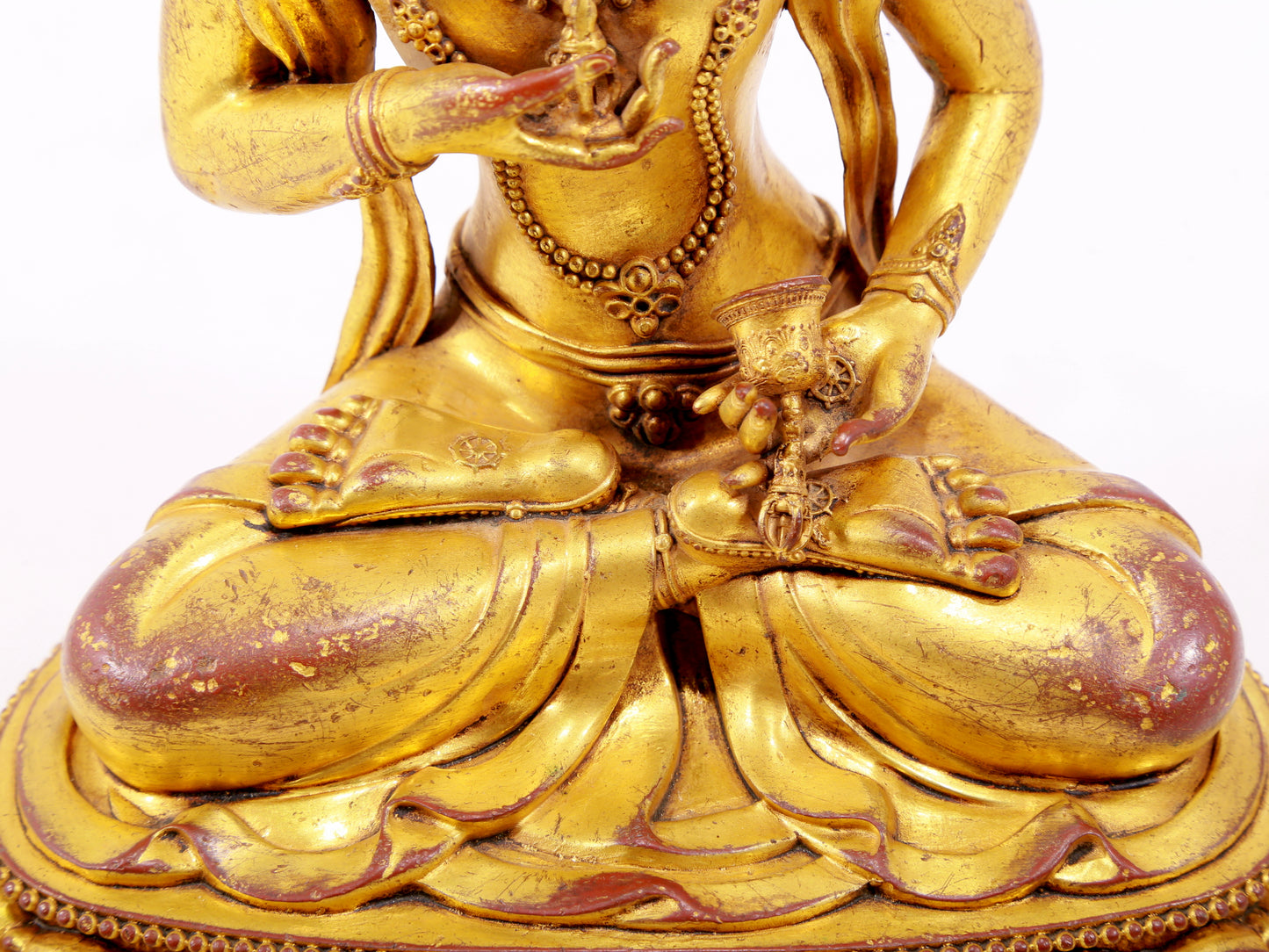 A solemn gilt bronze statue of Vajrasattva