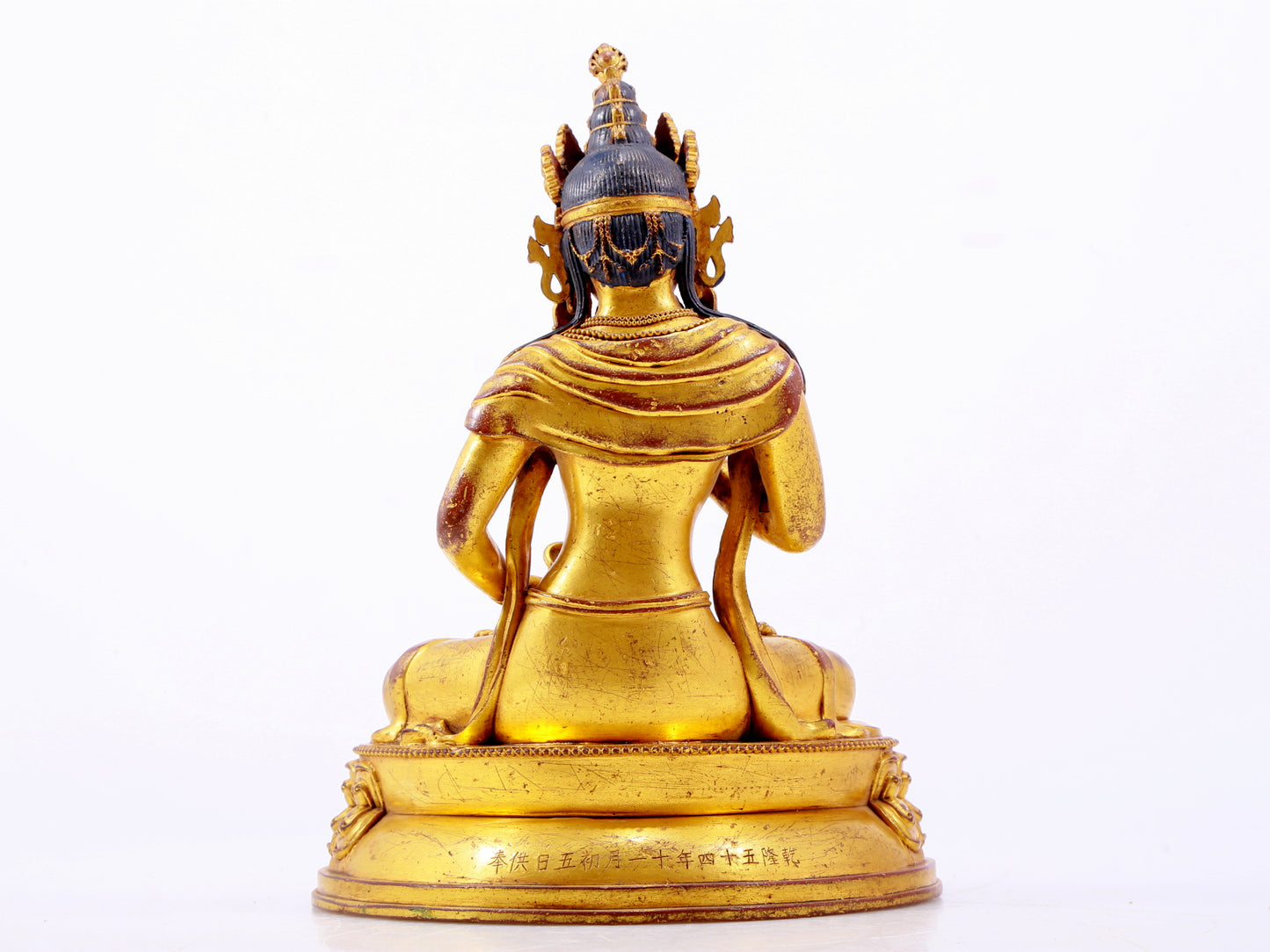 A solemn gilt bronze statue of Vajrasattva