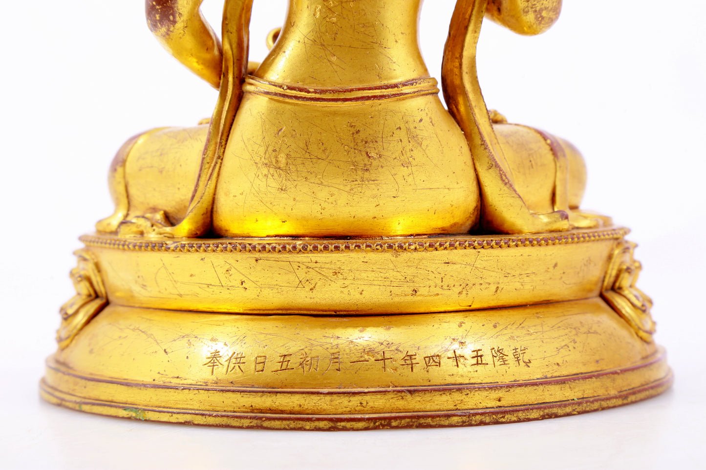 A solemn gilt bronze statue of Vajrasattva