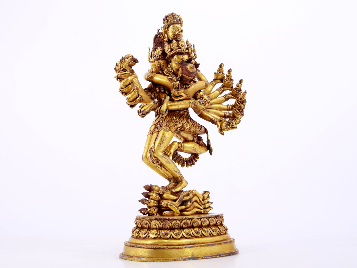 A solemn gilt bronze Vajra statue