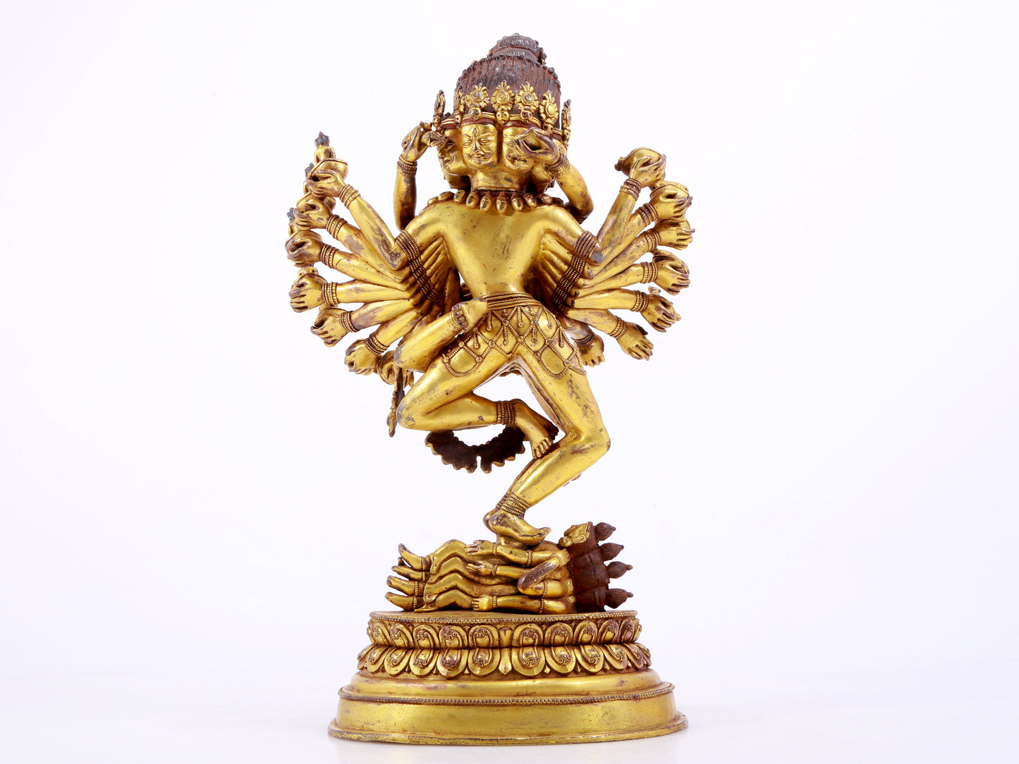 A solemn gilt bronze Vajra statue