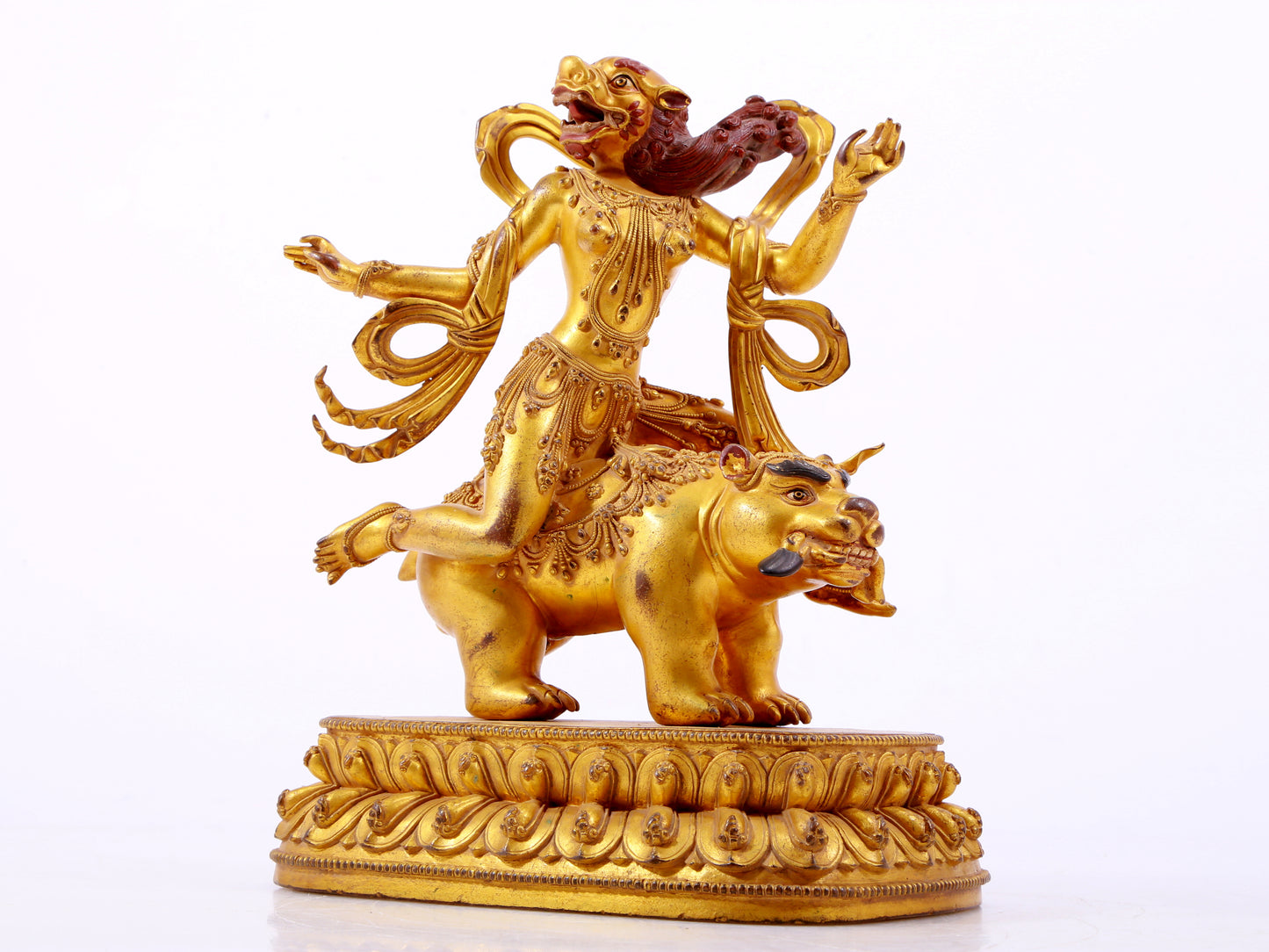 A majestic gilt bronze statue of the auspicious beast