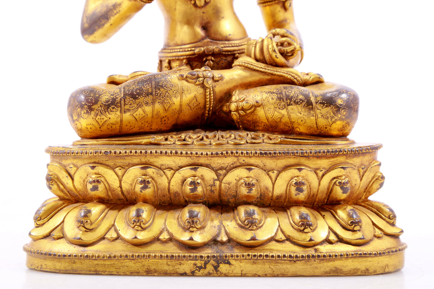 A solemn gilt bronze statue of Vajrasattva