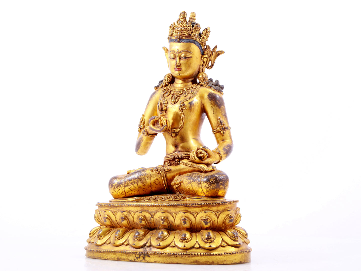 A solemn gilt bronze statue of Vajrasattva