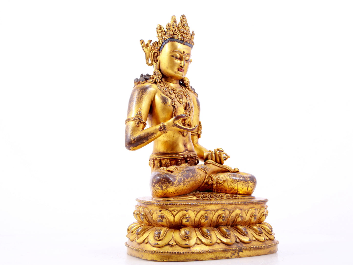 A solemn gilt bronze statue of Vajrasattva
