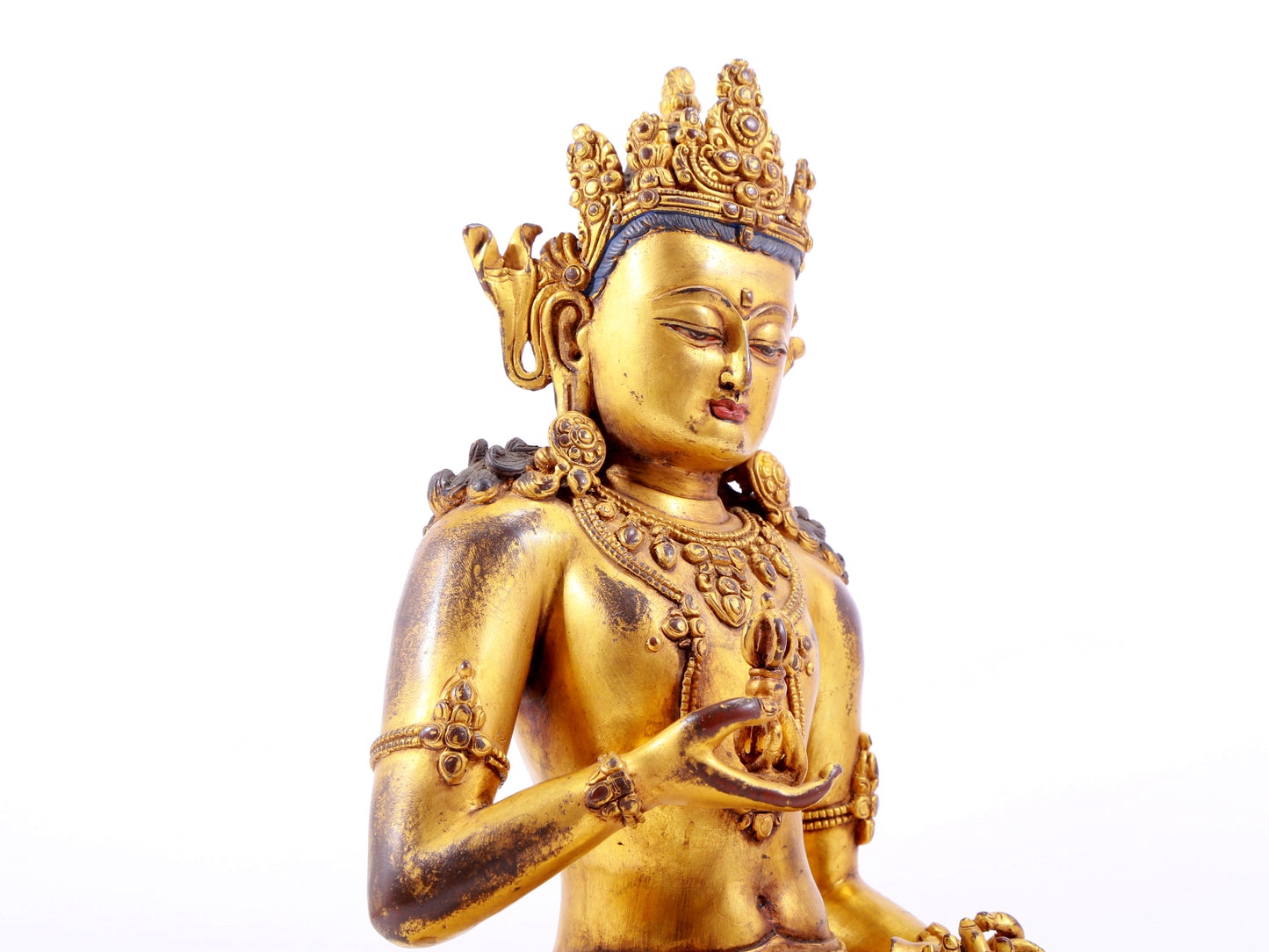 A solemn gilt bronze statue of Vajrasattva