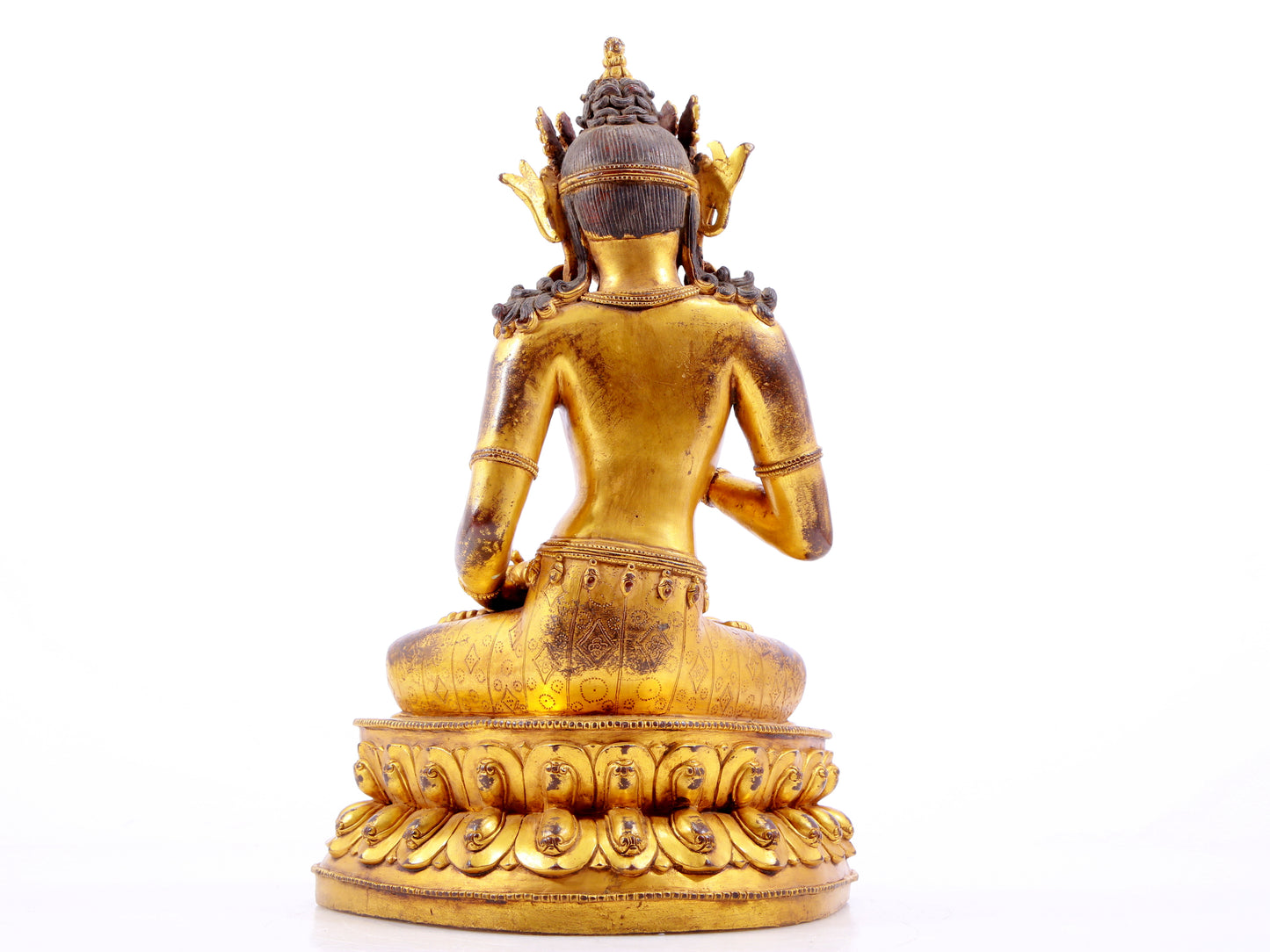 A solemn gilt bronze statue of Vajrasattva