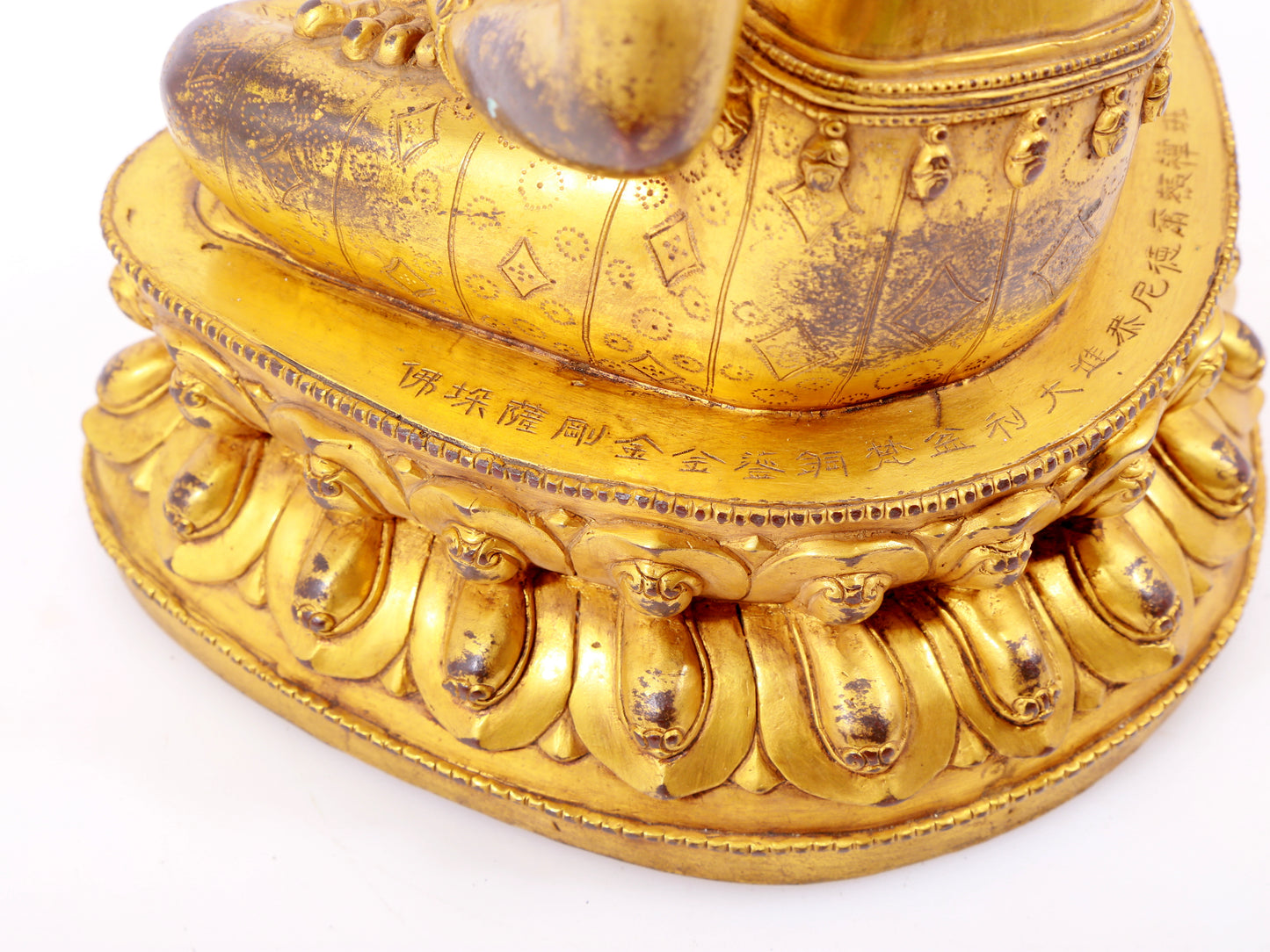 A solemn gilt bronze statue of Vajrasattva