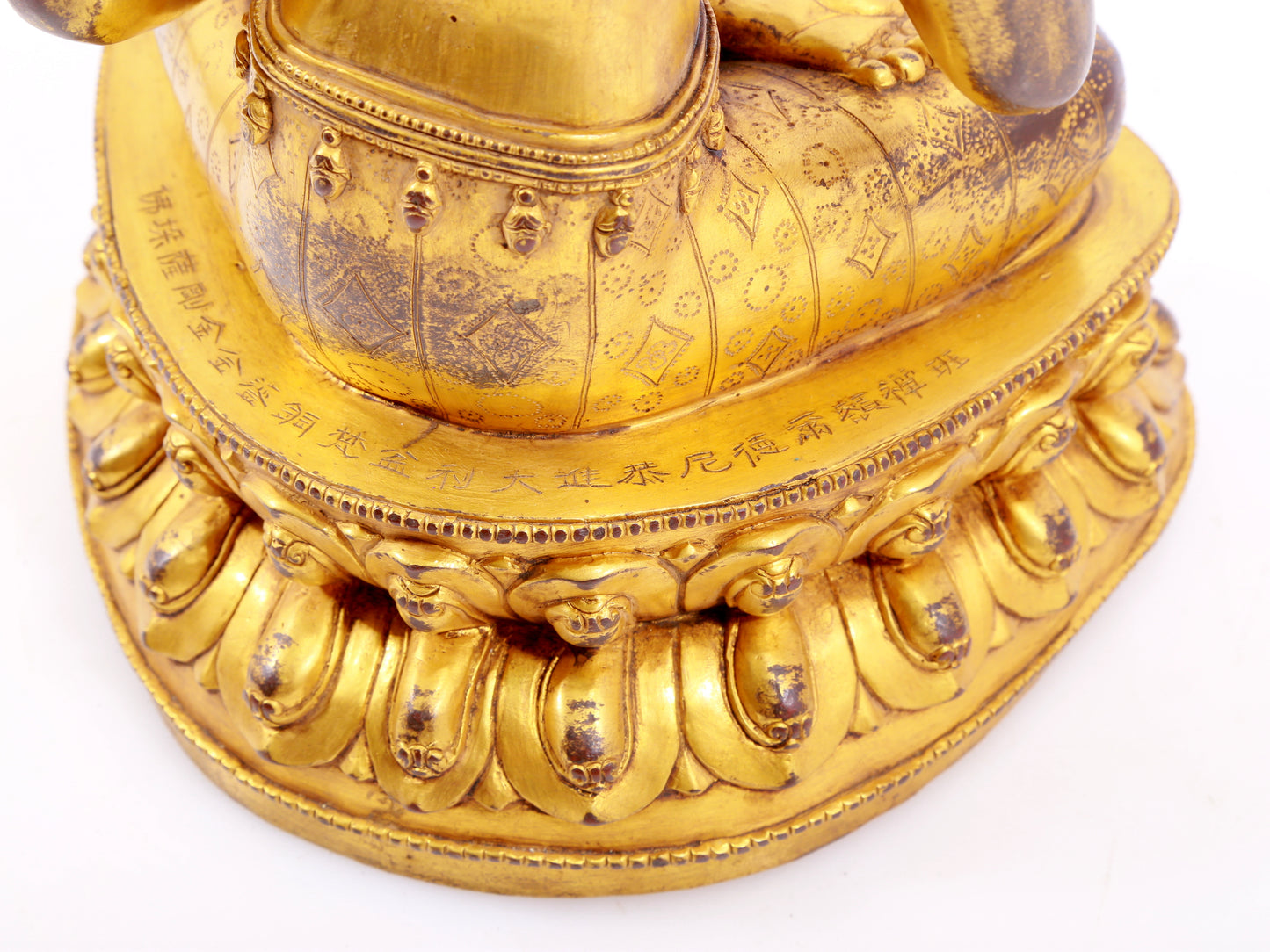 A solemn gilt bronze statue of Vajrasattva
