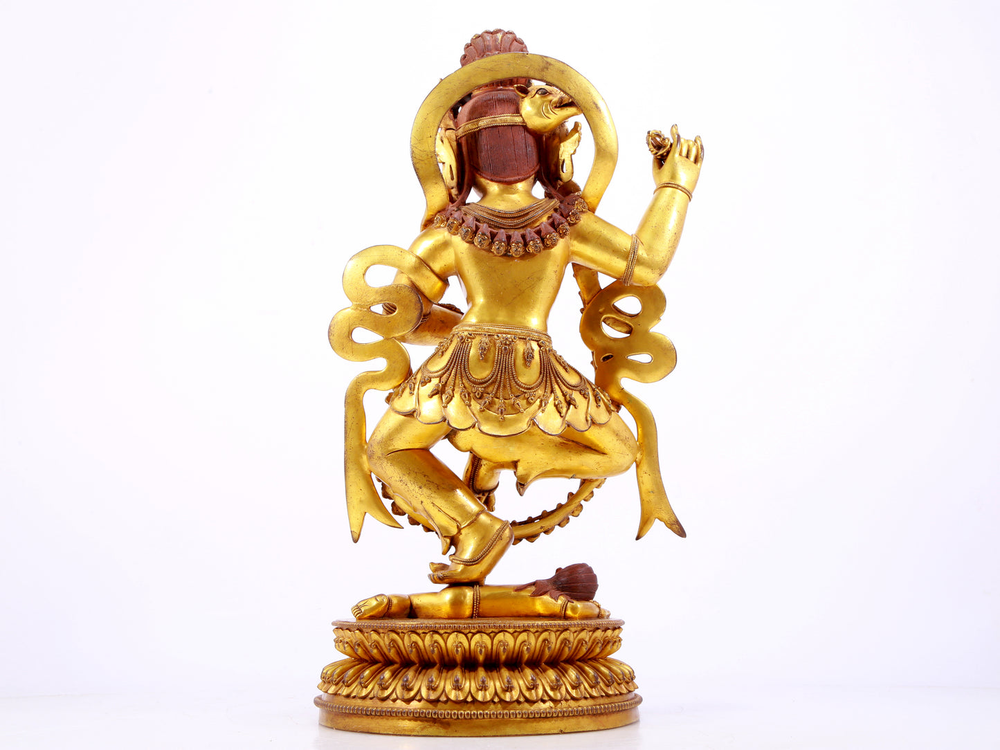 A solemn gilt bronze statue of the God of Wealth