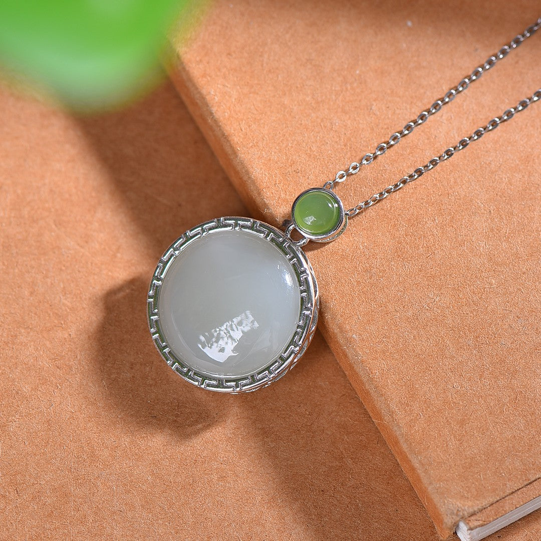 Silver inlaid Hetian jade pendant