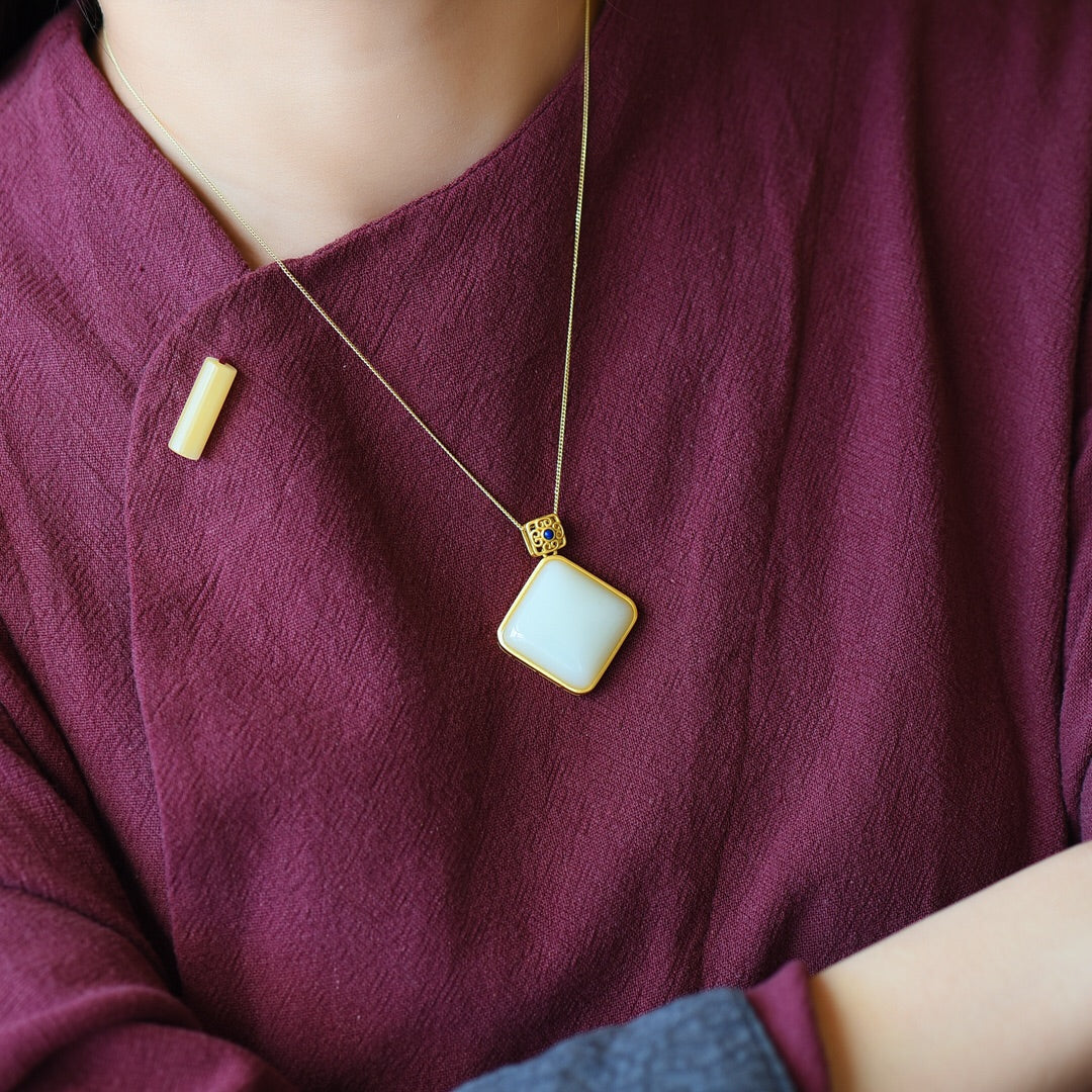 Silver gold plated Hetian jade pendant