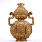 An Excellent Gilt-Bronze 'Weapons Of The Eight Immortals' Ruyi-Handled Gourd-Form Vase