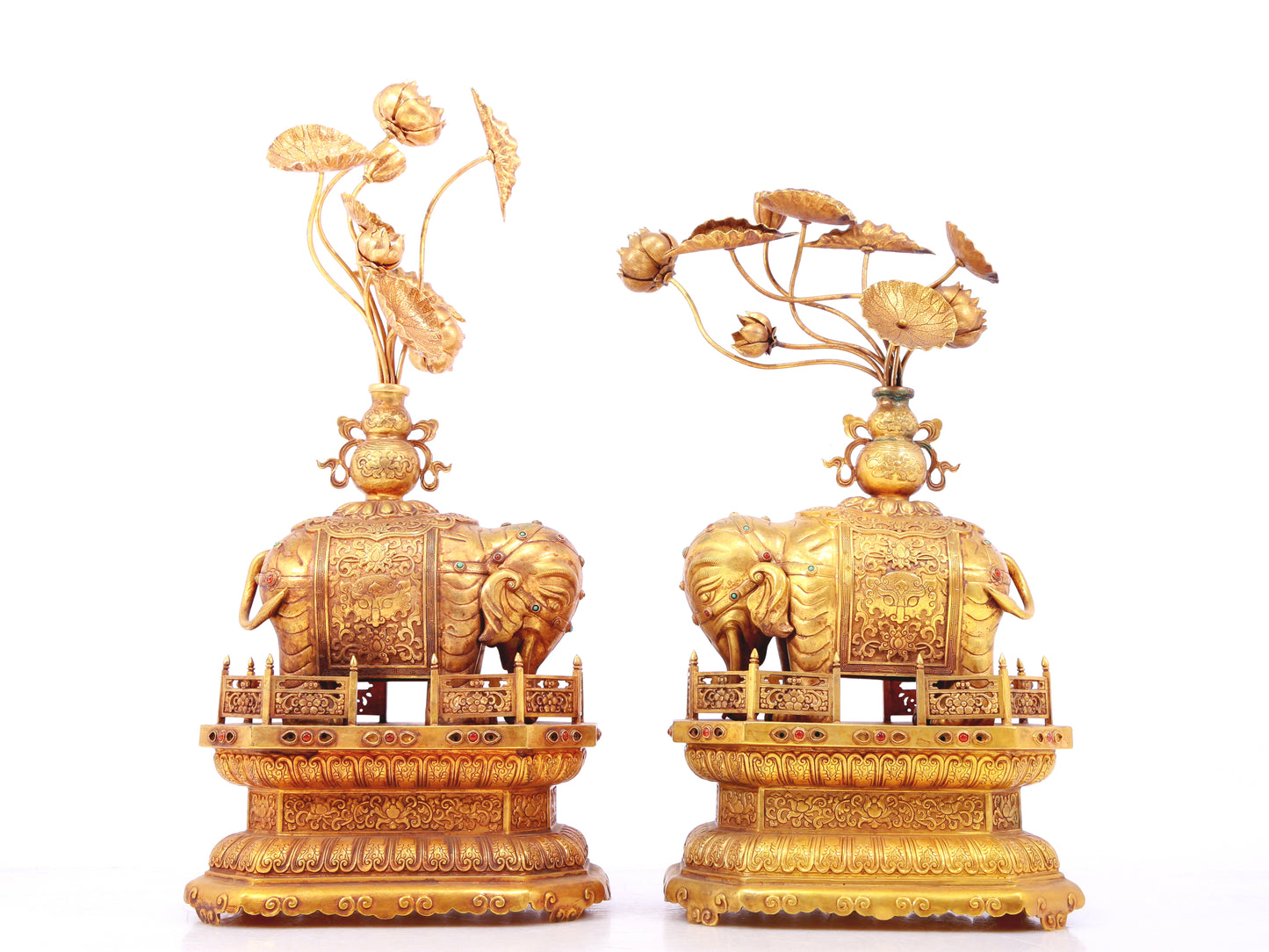 A pair of precious gilt bronze elephant ornaments