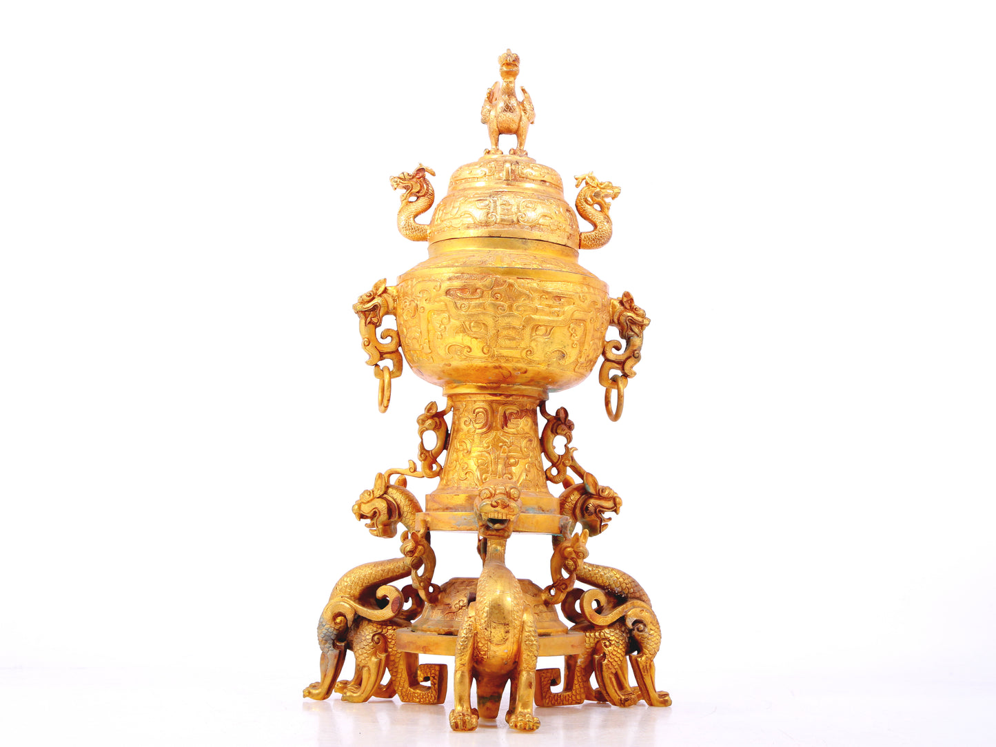 An exquisite gilt bronze double-eared stove with dragon and phoenix patterns and lid