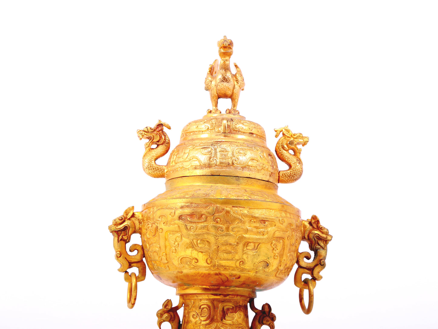 An exquisite gilt bronze double-eared stove with dragon and phoenix patterns and lid