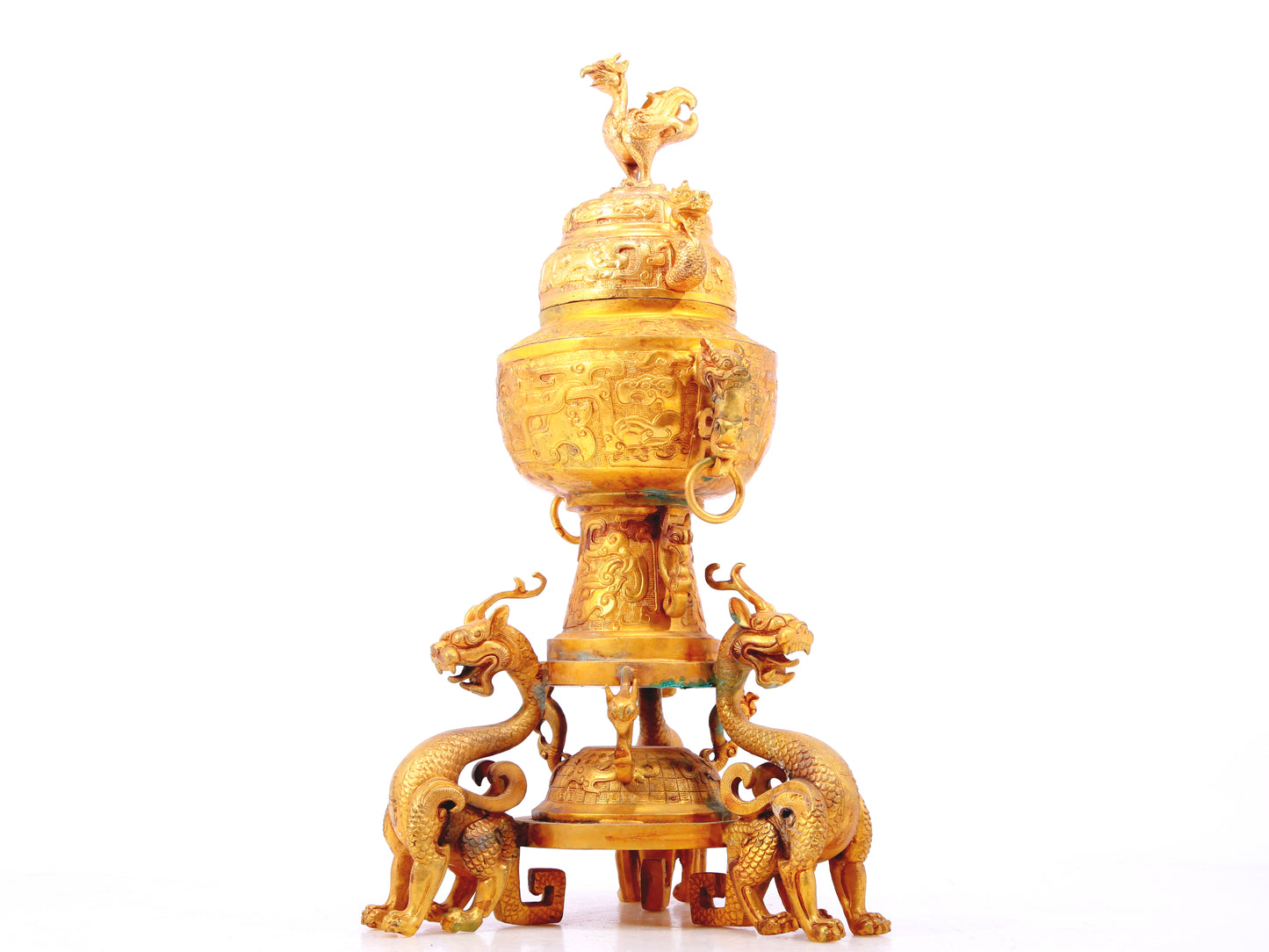 An exquisite gilt bronze double-eared stove with dragon and phoenix patterns and lid