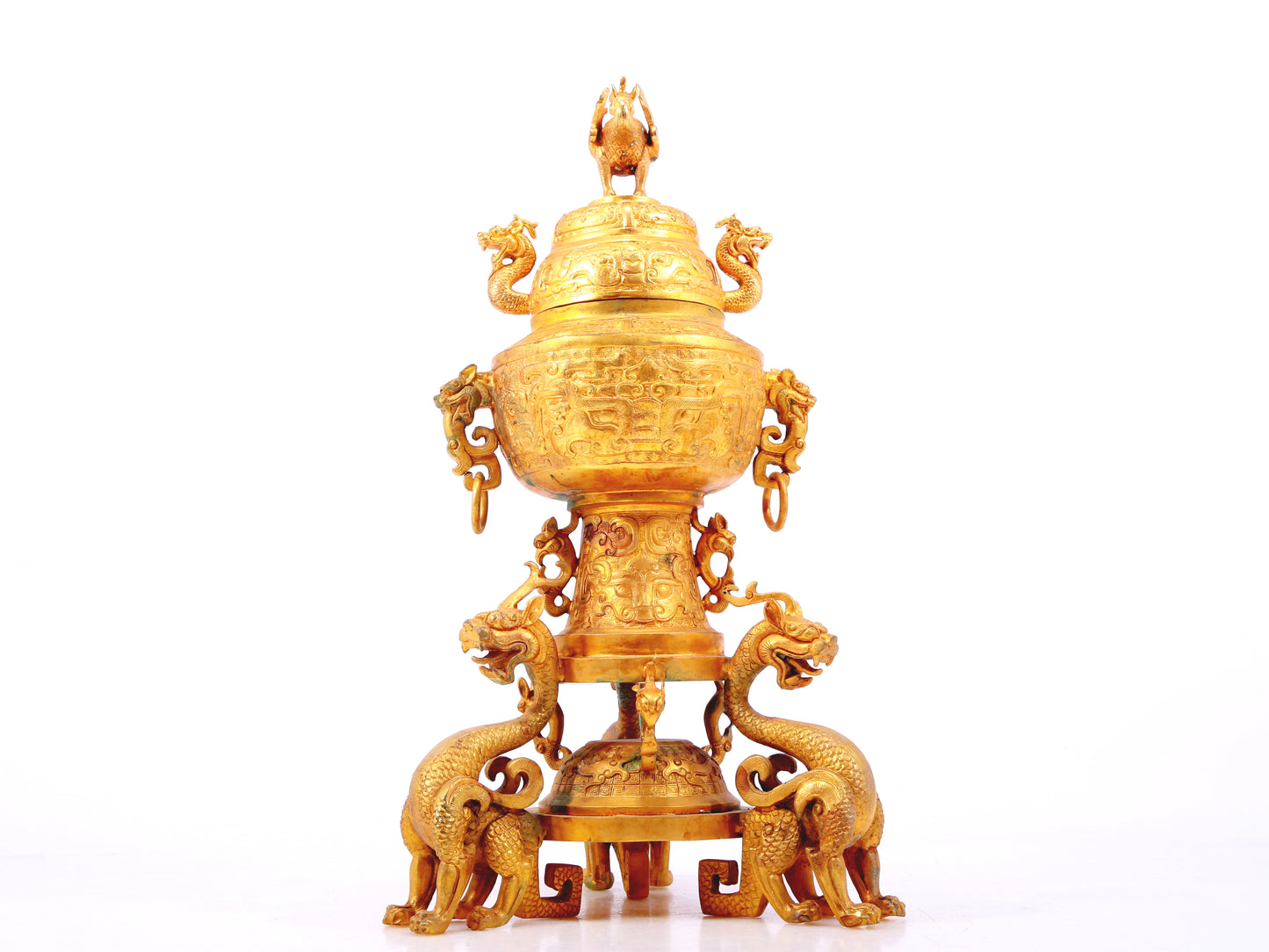 An exquisite gilt bronze double-eared stove with dragon and phoenix patterns and lid