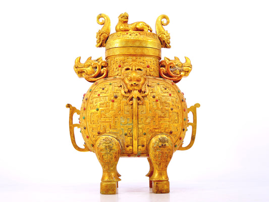 An exquisite gilt bronze double-eared stove with dragon and phoenix patterns and lid