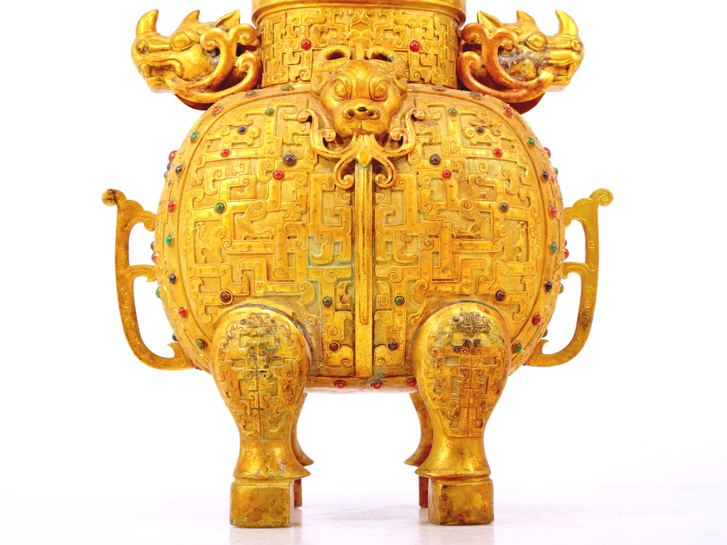 An exquisite gilt bronze double-eared stove with dragon and phoenix patterns and lid