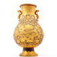 A perfect pair of gilt bronze and silver amphora with lotus and dragon patterns