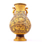 A perfect pair of gilt bronze and silver amphora with lotus and dragon patterns