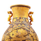 A perfect pair of gilt bronze and silver amphora with lotus and dragon patterns