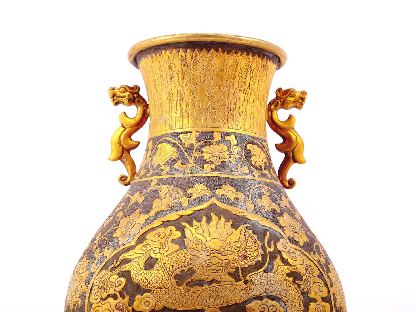 A perfect pair of gilt bronze and silver amphora with lotus and dragon patterns