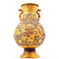 A perfect pair of gilt bronze and silver amphora with lotus and dragon patterns