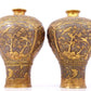 A perfect pair of gilt bronze and silver vases with flowers and birds