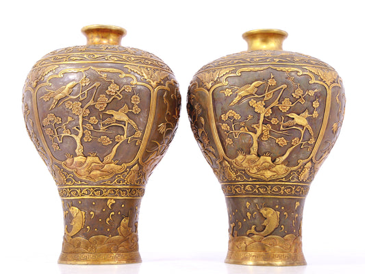 A perfect pair of gilt bronze and silver vases with flowers and birds