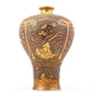 A perfect pair of gilt bronze and silver vases with flowers and birds