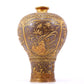 A perfect pair of gilt bronze and silver vases with flowers and birds