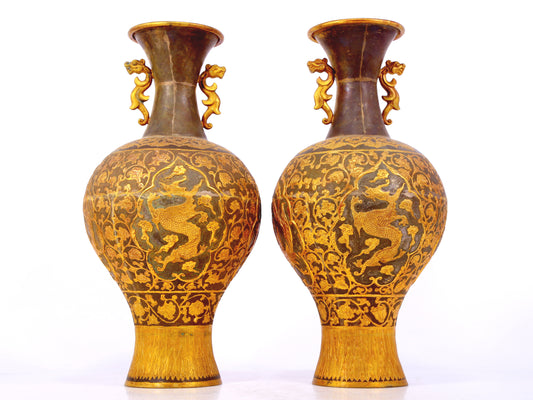 A perfect pair of gilt bronze amphora with lotus, auspicious and animal patterns