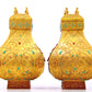 A perfect pair of gilt bronze amphora with lotus, auspicious and animal patterns