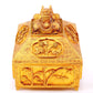 A gilt bronze Buddha box with floral and dragon patterns