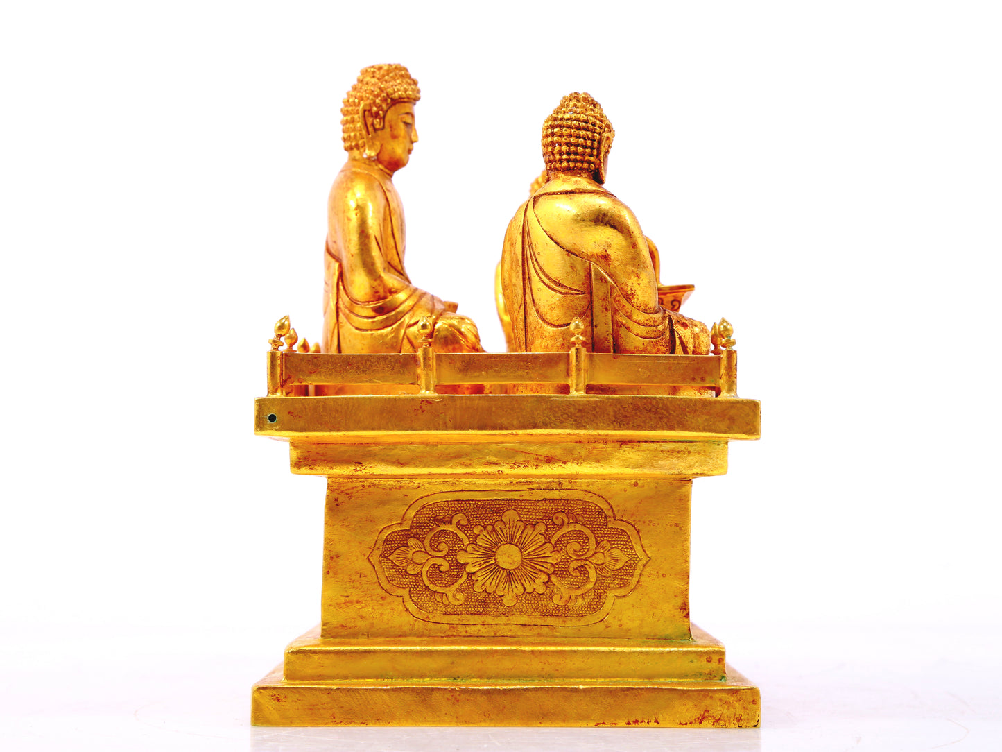 A gilt bronze Buddha box with floral and dragon patterns