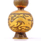 An exquisite gilt bronze bottle with dragon and phoenix patterns and lid