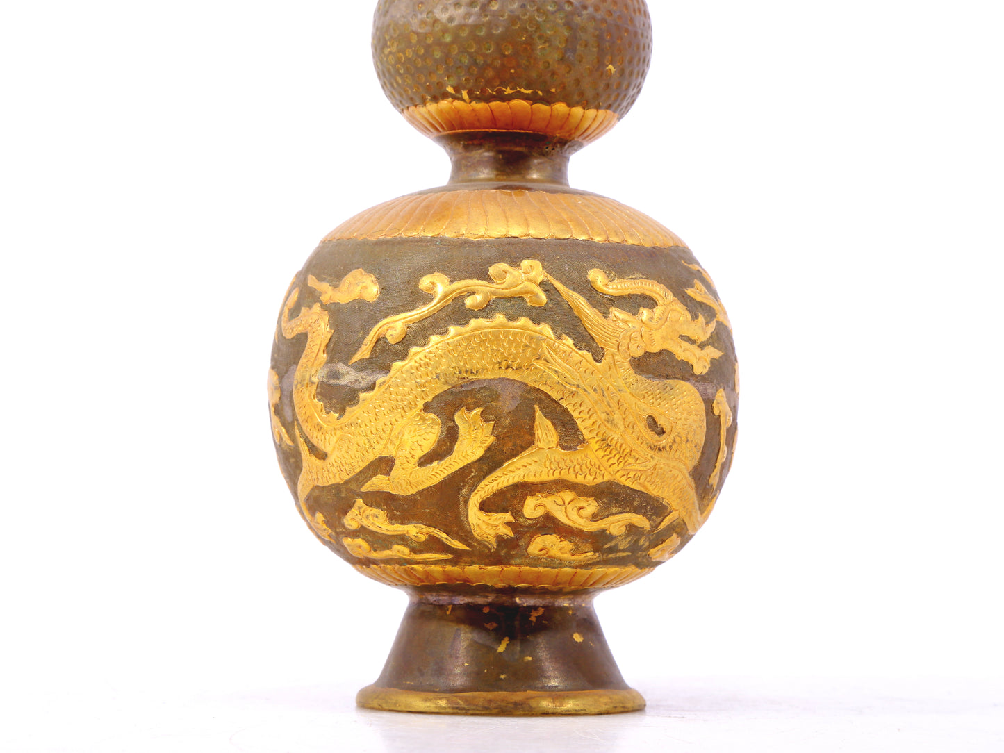 An exquisite gilt bronze bottle with dragon and phoenix patterns and lid