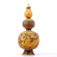 An exquisite gilt bronze bottle with dragon and phoenix patterns and lid