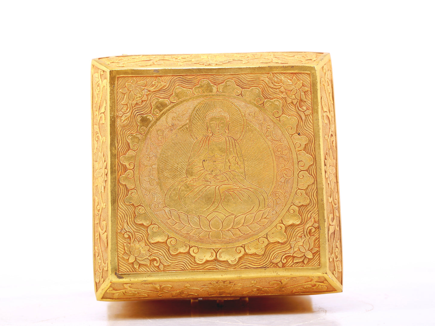 An exquisite gilt bronze image box of Gautama Buddha