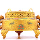 An exquisite gilt bronze censer with two ears and three legs inlaid with a hundred treasures, auspicious clouds and dragon and phoenix patterns, with a lid.