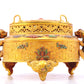 An exquisite gilt bronze censer with two ears and three legs inlaid with a hundred treasures, auspicious clouds and dragon and phoenix patterns, with a lid.