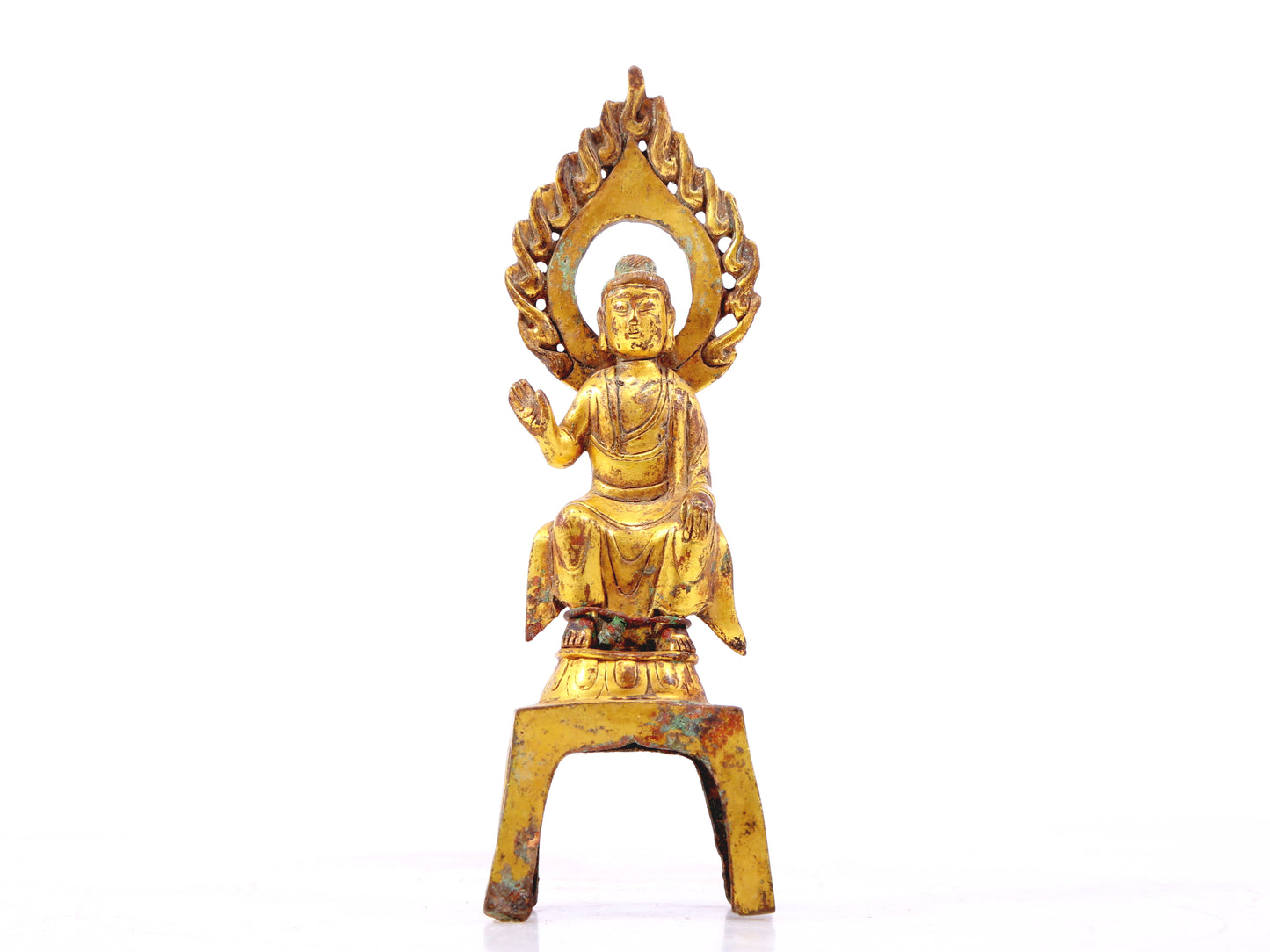 A sacred gilt bronze statue of Gautama Buddha